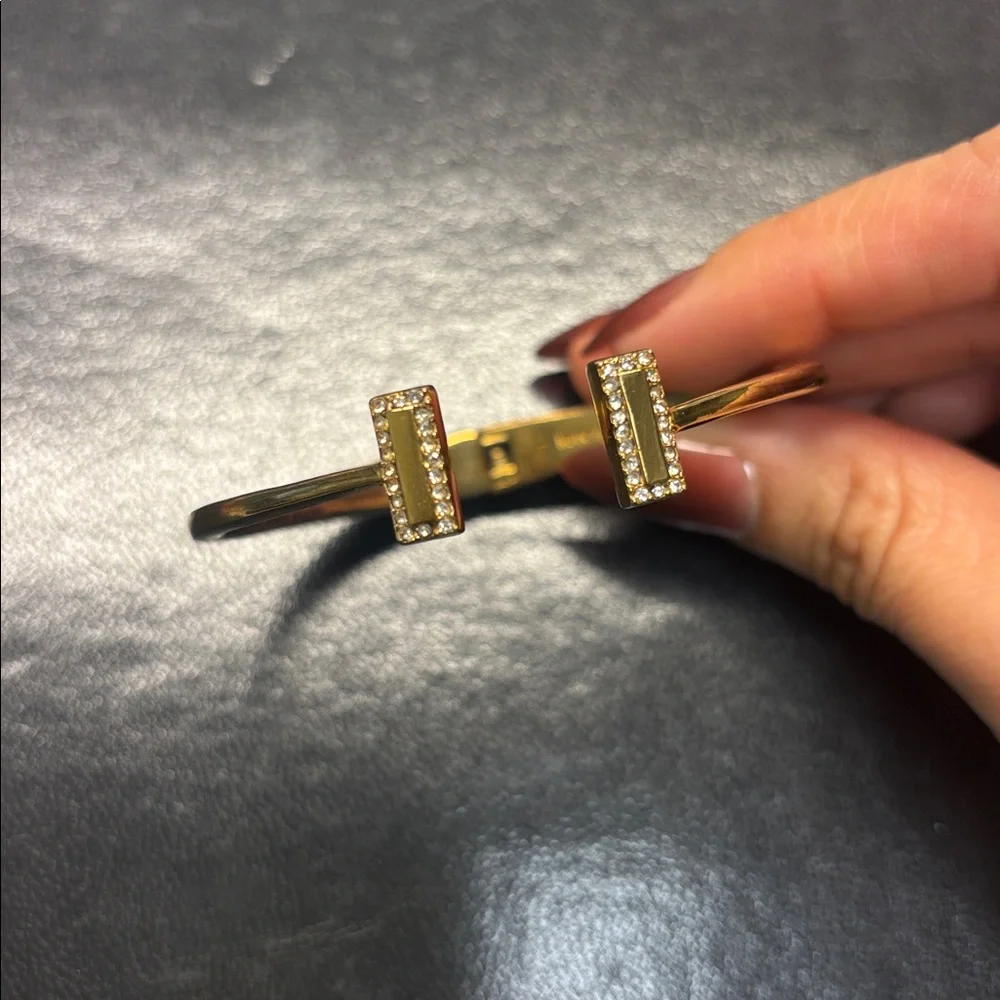 Kate Spade Raising The Bar gold tone bangle